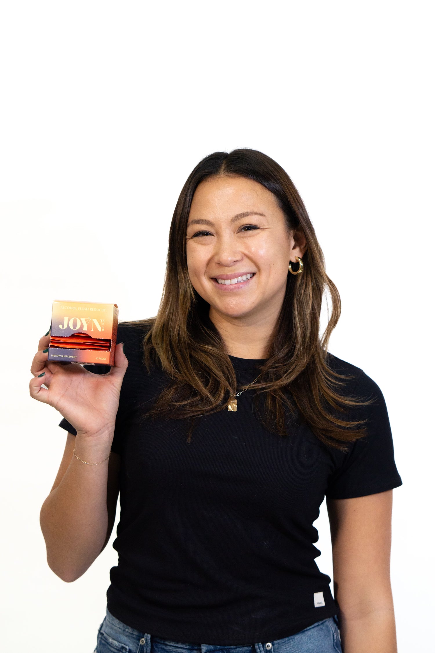Woman holding a box of JOYN